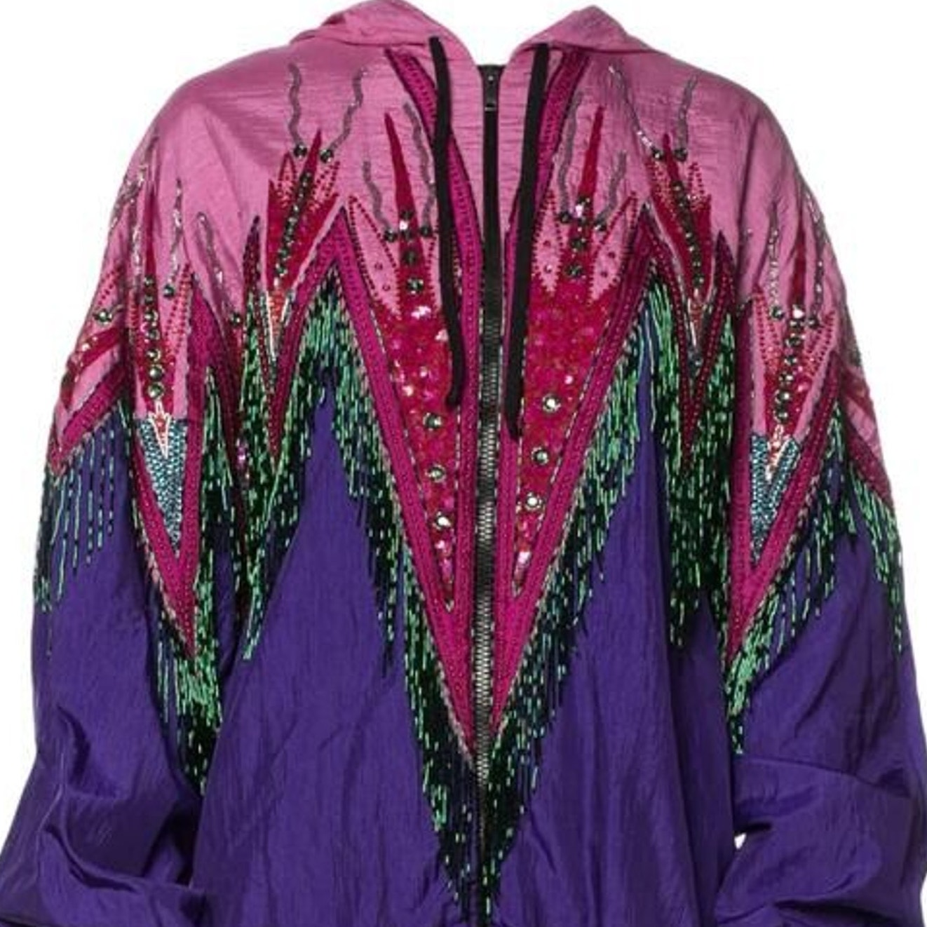 A hooded zip-up jacket featuring a bold geometric pattern with a pink upper section, a purple lower section, and a central magenta chevron embellished with sequins and bead fringe in green, black, and silver.